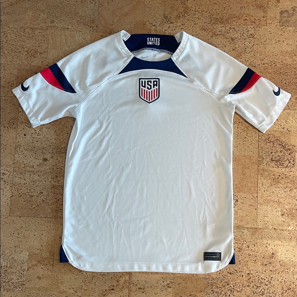 Nike Kids White Jersey with Red and Blue Accents